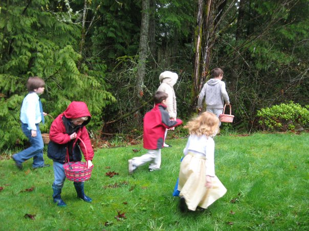 children in a park hunting for easter eggs