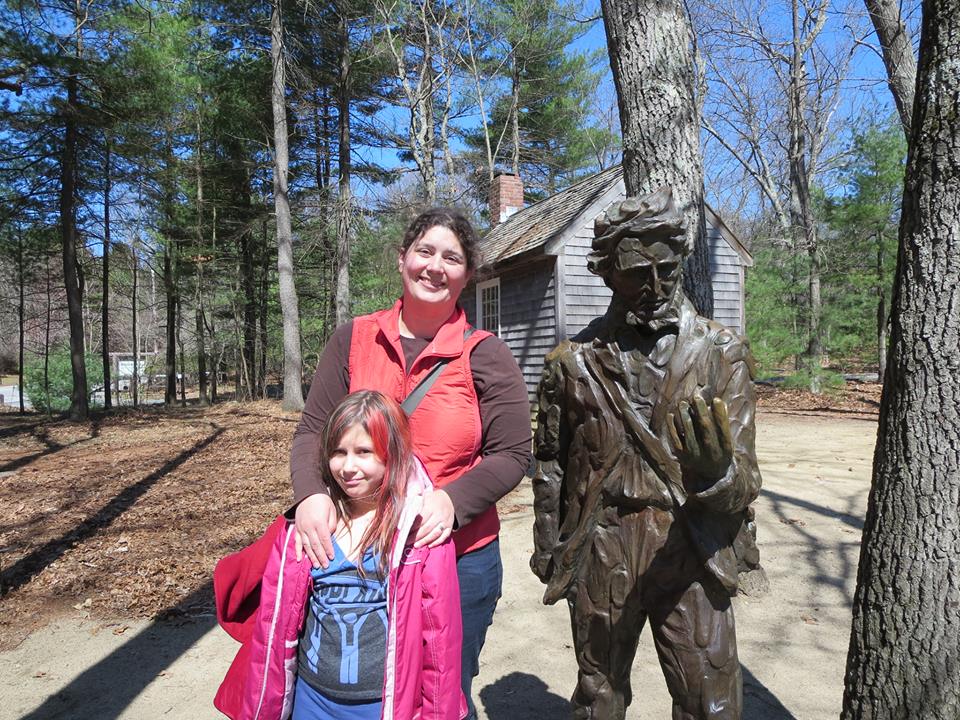 Sara and a statue of Thoreau