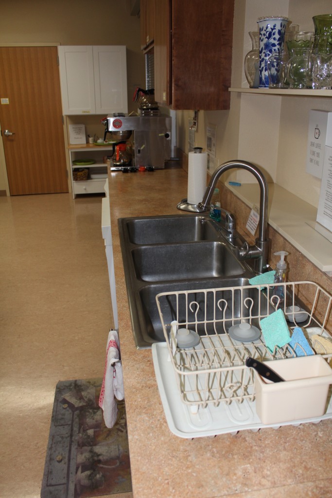 close up of the sinks and dish drainer