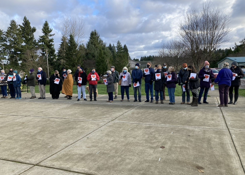 Community members in a row at Islamic Center